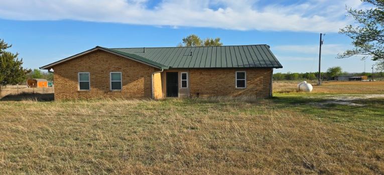 126 County Road 153 Georgetown, TX 78626 - Photo 1 of 13 a view of a house with a yard