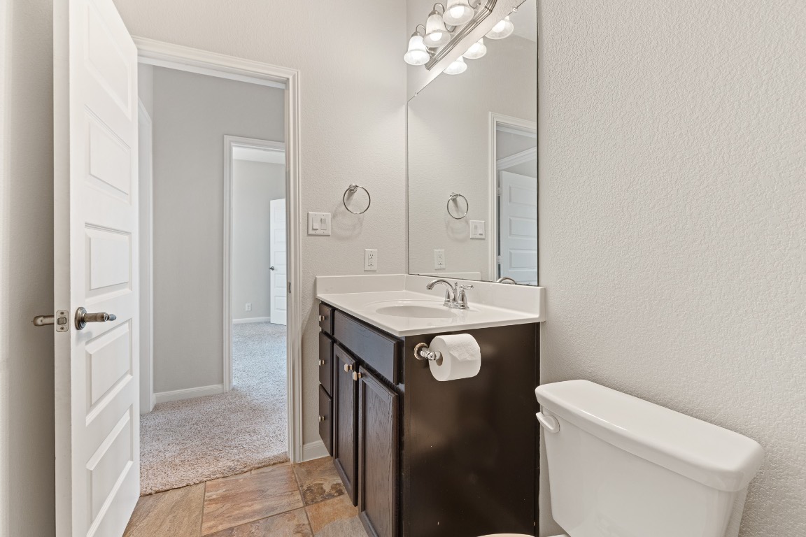 506 Hummingbird Lane, Unit A Austin, TX 78734 - Photo 20 of 36 a bathroom with a sink toilet and shower