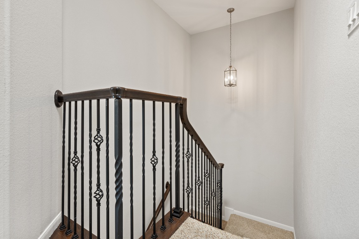 506 Hummingbird Lane, Unit A Austin, TX 78734 - Photo 23 of 36 a view of a hallway with wooden floor