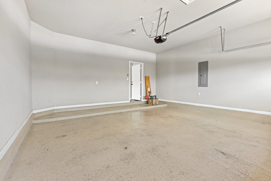 506 Hummingbird Lane, Unit A Austin, TX 78734 - Photo 32 of 36 a view of a livingroom with a ceiling fan and window
