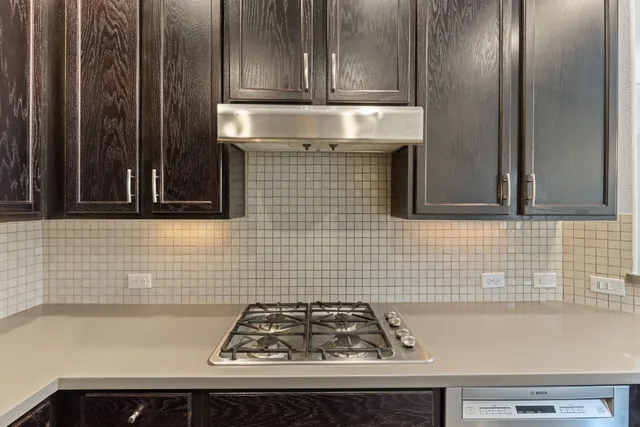 a bathroom with a sink toilet and a mirror