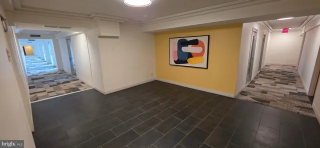 a kitchen with a sink appliances and cabinets