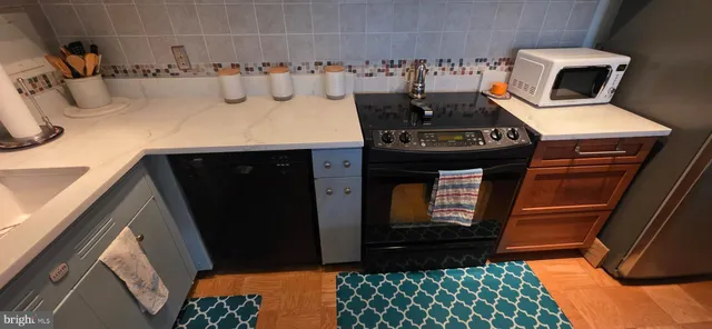 a living room with furniture dining table and wooden floor
