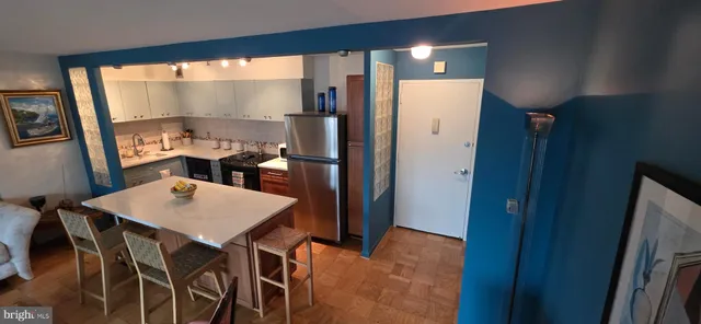 a kitchen with a stove and a microwave