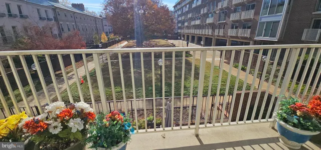 a view of a shop on the street