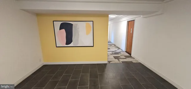 a view of a livingroom with wooden floor