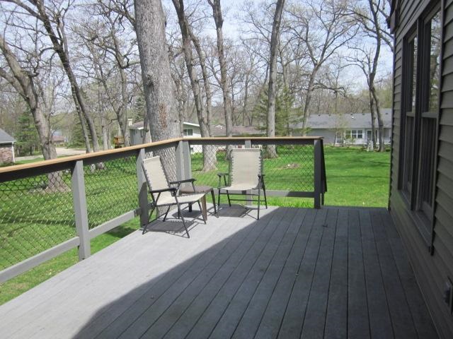 2037 Hillsdown Road Lake Summerset, IL 61019 - Photo 16 of 24 a view of a deck with wooden floor and fence