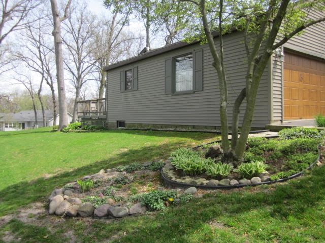 2037 Hillsdown Road Lake Summerset, IL 61019 - Photo 21 of 24 a view of a house with a yard