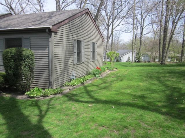 2037 Hillsdown Road Lake Summerset, IL 61019 - Photo 22 of 24 a view of a house with a backyard