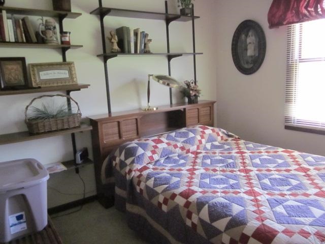 2037 Hillsdown Road Lake Summerset, IL 61019 - Photo 9 of 24 a large bed sitting in a bedroom next to a window