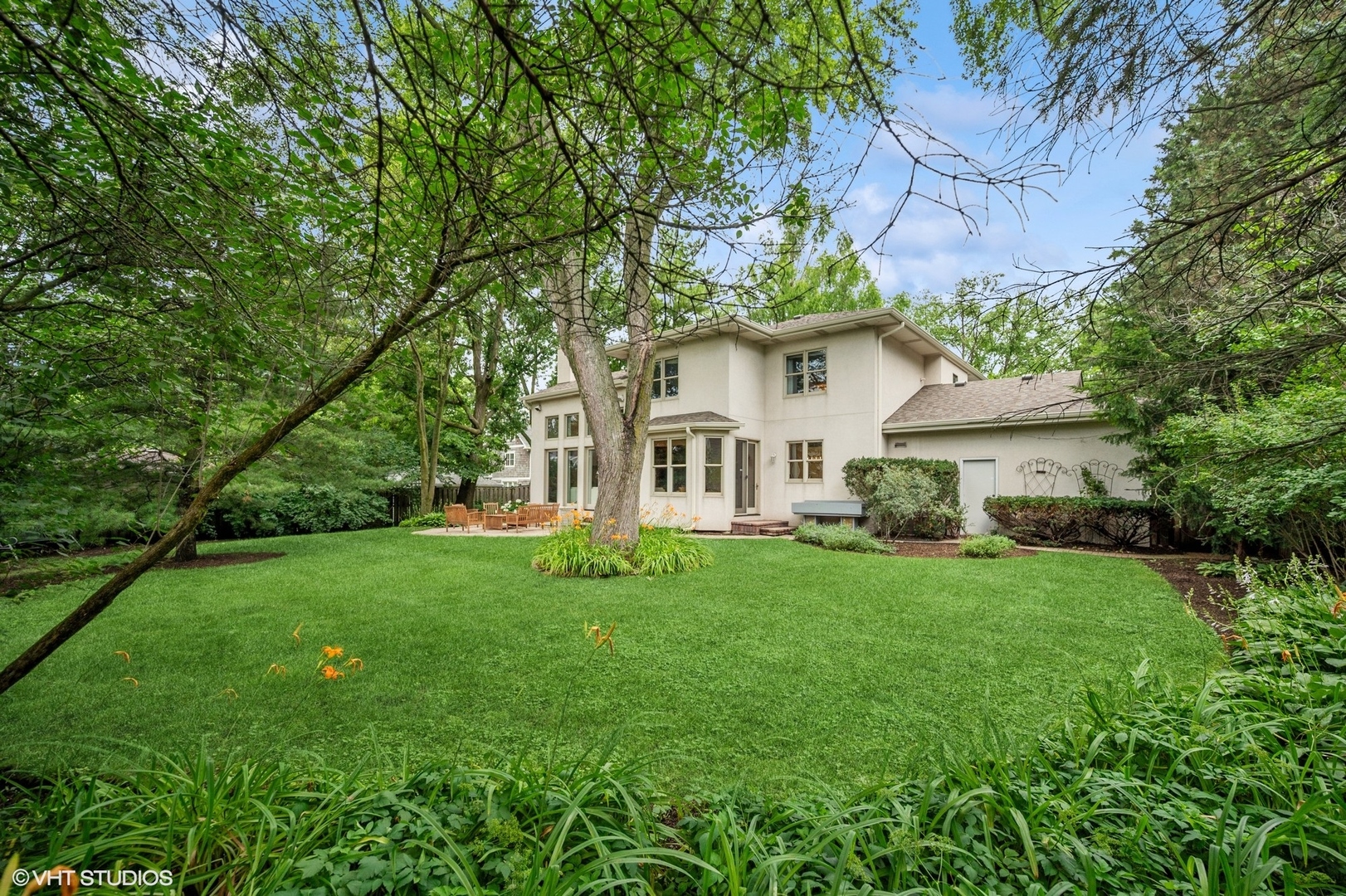 2007 Wilmette Avenue Wilmette, IL 60091 - Photo 31 of 35 a view of a house with a yard and a garden