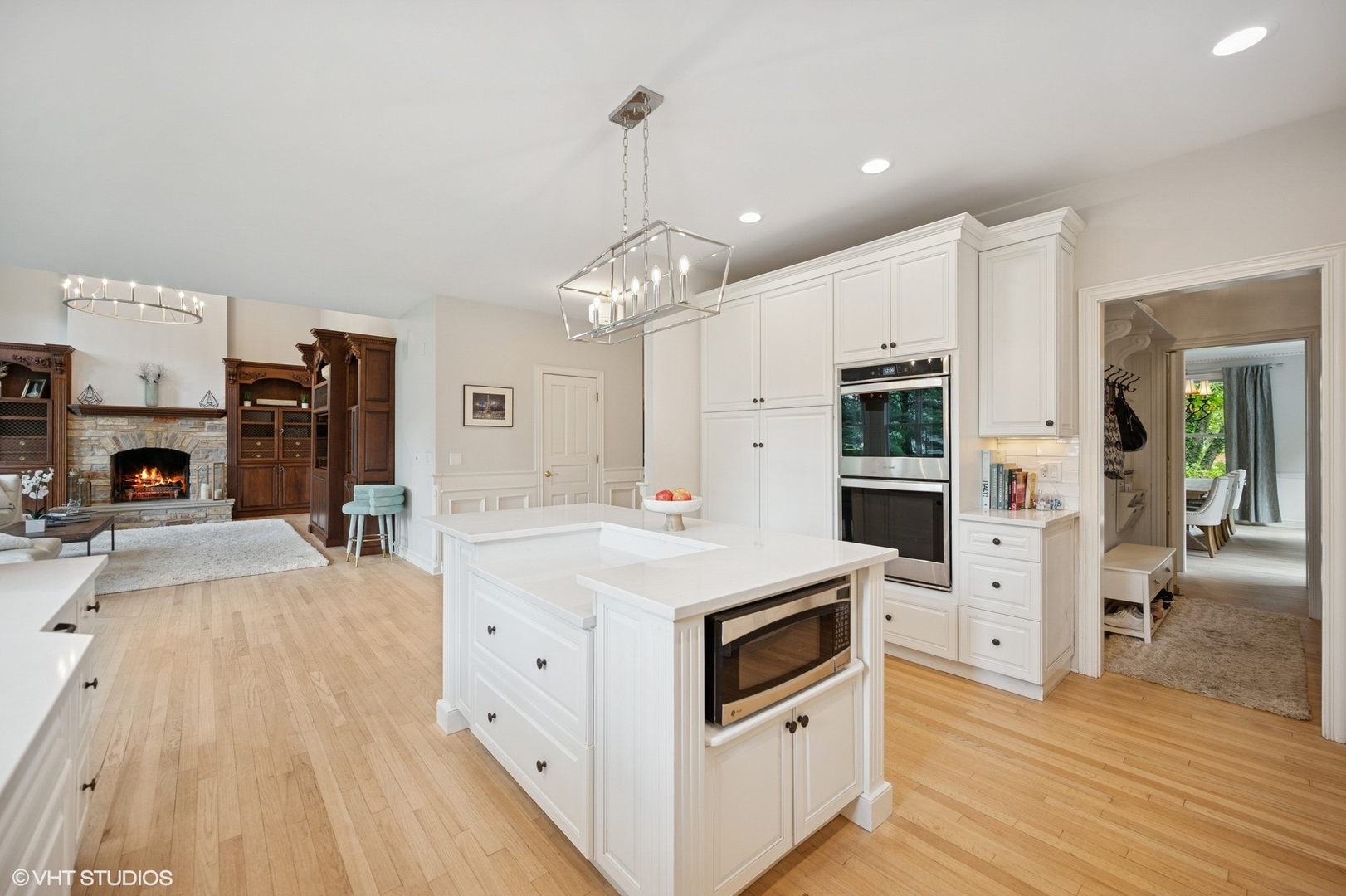 2007 Wilmette Avenue Wilmette, IL 60091 - Photo 10 of 35 a white kitchen with stainless steel appliances granite countertop a stove and refrigerator