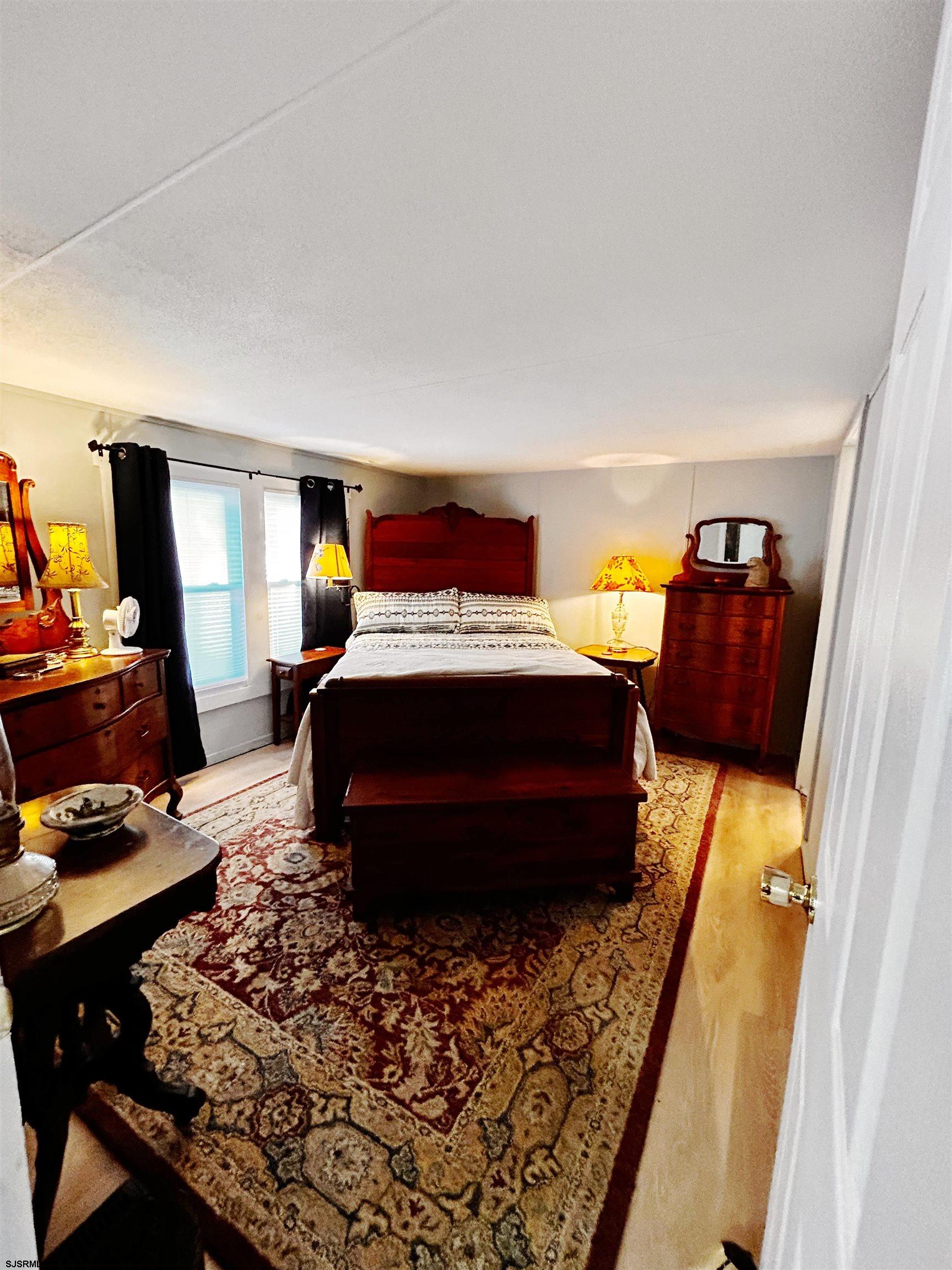 260 Marshall Mill Road Malaga, NJ 08328 - Photo 15 of 19 a bedroom with a bed and a window