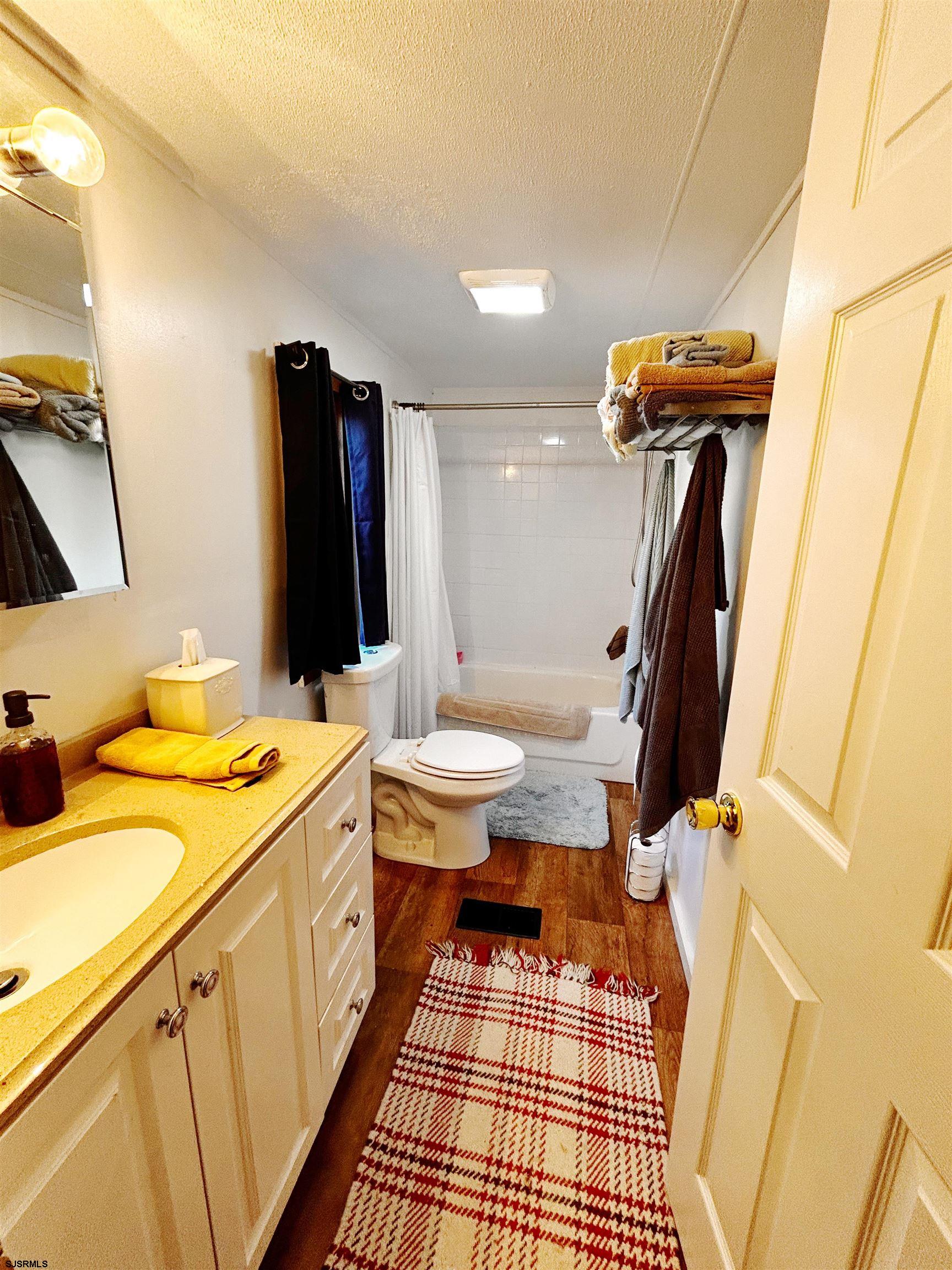 260 Marshall Mill Road Malaga, NJ 08328 - Photo 16 of 19 a bathroom with a sink toilet and shower