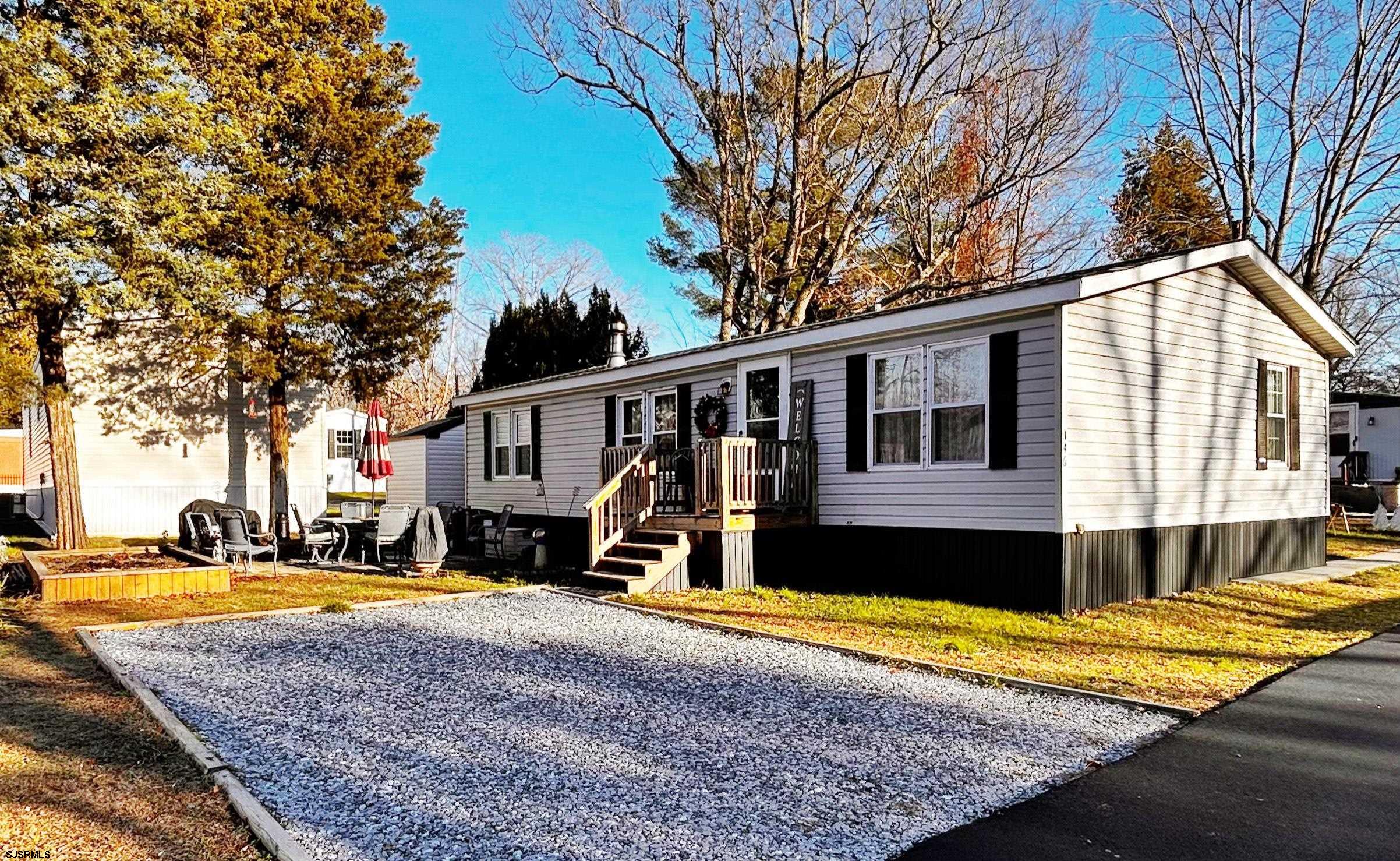 260 Marshall Mill Road Malaga, NJ 08328 - Photo 2 of 19 a view of a house with a swimming pool and sitting area