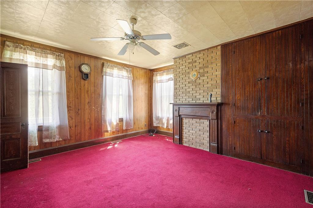 481 Dille Run Road Prosperity, PA 15329 - Photo 29 of 38 an empty room with windows and fan