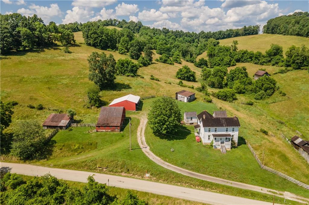 481 Dille Run Road Prosperity, PA 15329 - Photo 3 of 38 an aerial view of a house with a yard