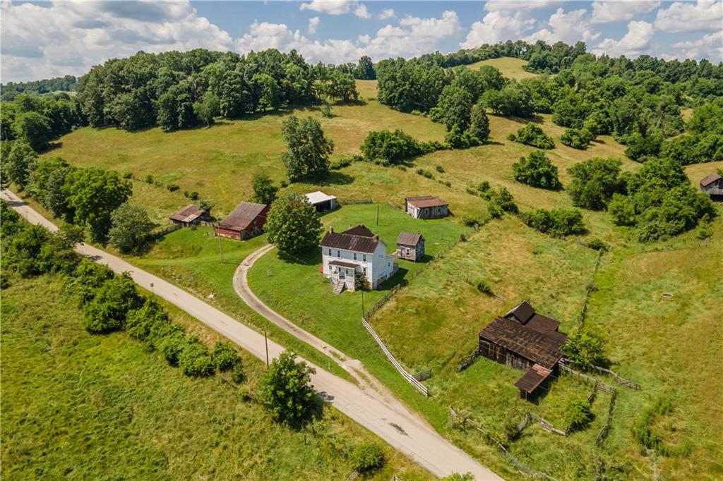 481 Dille Run Road Prosperity, PA 15329 - Photo 4 of 38 an aerial view of a house with a yard