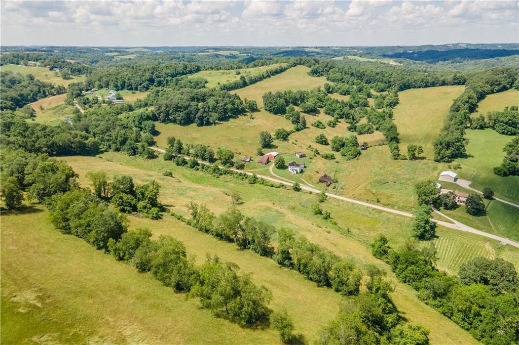 481 Dille Run Road Prosperity, PA 15329 - Photo 5 of 38 a view of a lake with a houses