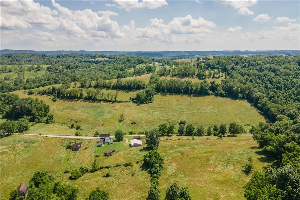 481 Dille Run Road Prosperity, PA 15329 - Photo 6 of 38 a view of a lake with houses in the back