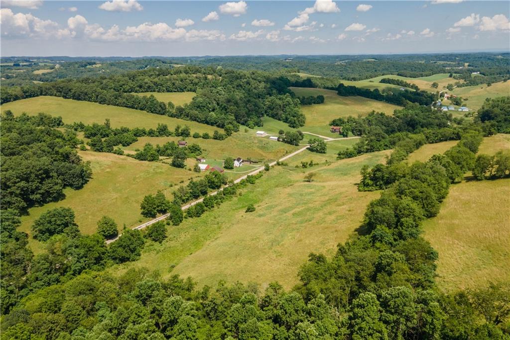 481 Dille Run Road Prosperity, PA 15329 - Photo 8 of 38 an aerial view of residential houses with outdoor space and river