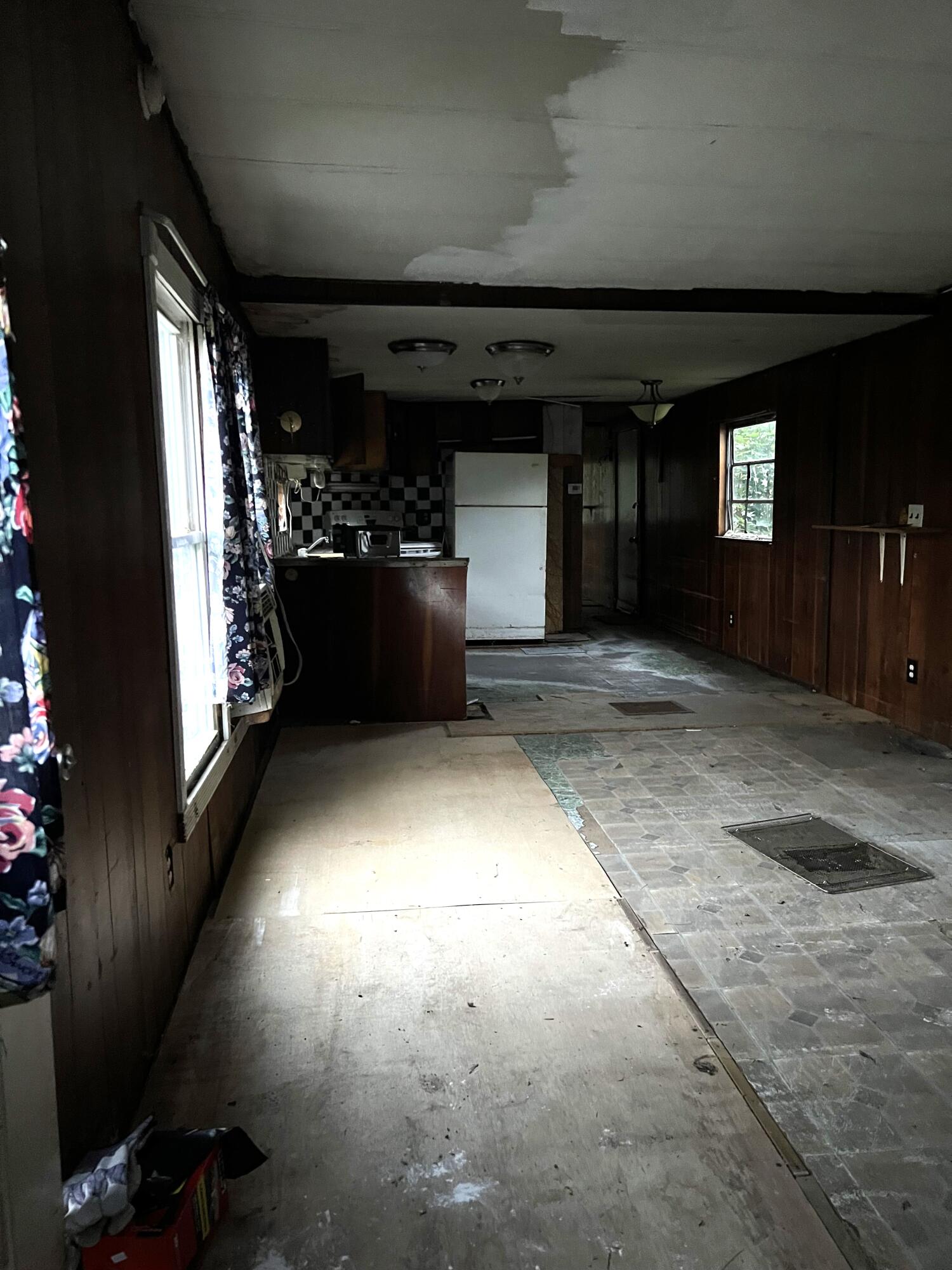 35 2nd Street Milo, ME 04463 - Photo 3 of 17 Living room to kitchen 35 2nd