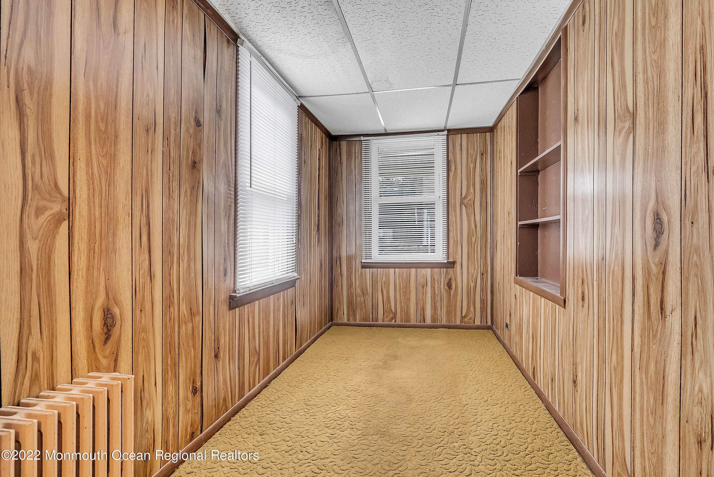 97 Mechanic Street Red Bank, NJ 07701 - Photo 11 of 28 a view of an empty room with a window