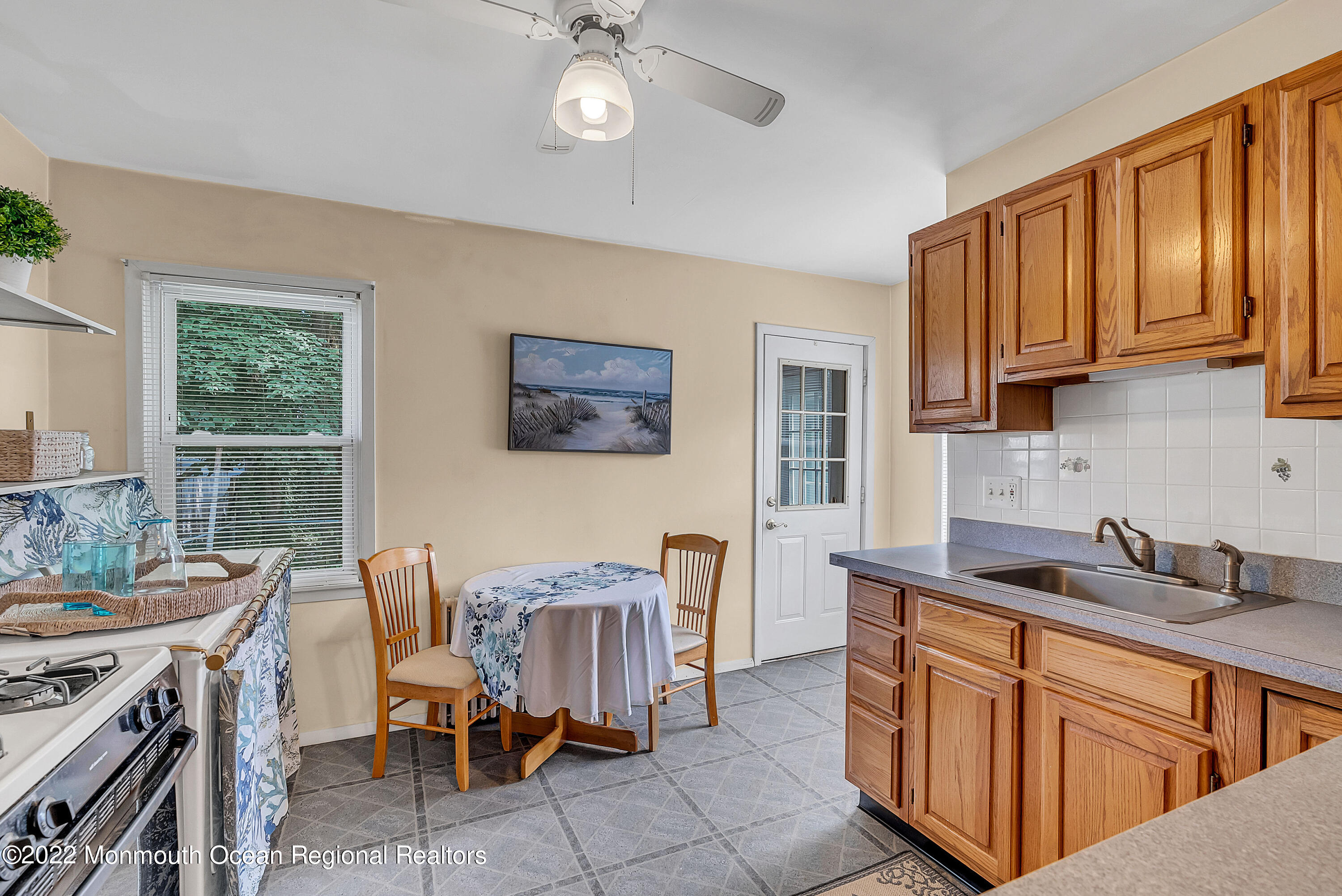 97 Mechanic Street Red Bank, NJ 07701 - Photo 13 of 28 a kitchen that has a cabinets counter space and appliances