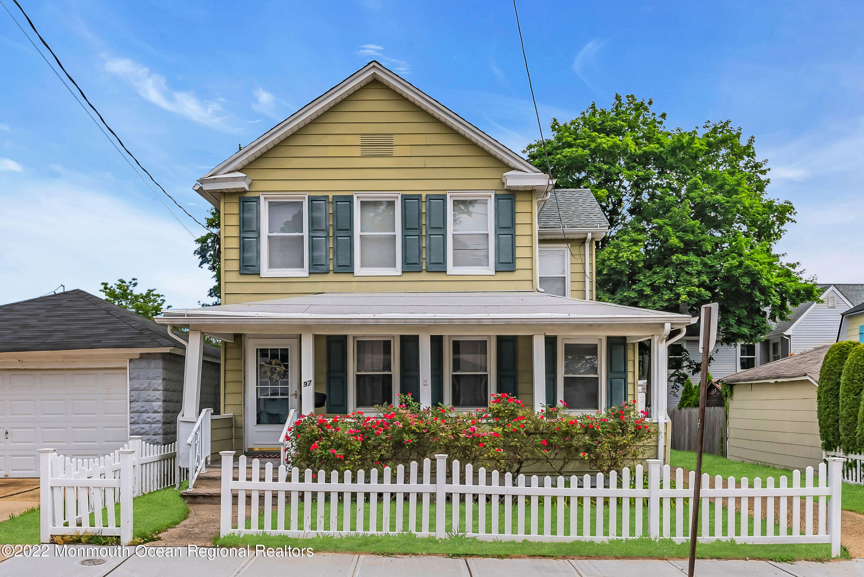97 Mechanic Street Red Bank, NJ 07701 - Photo 27 of 28 front view of a house with a yard