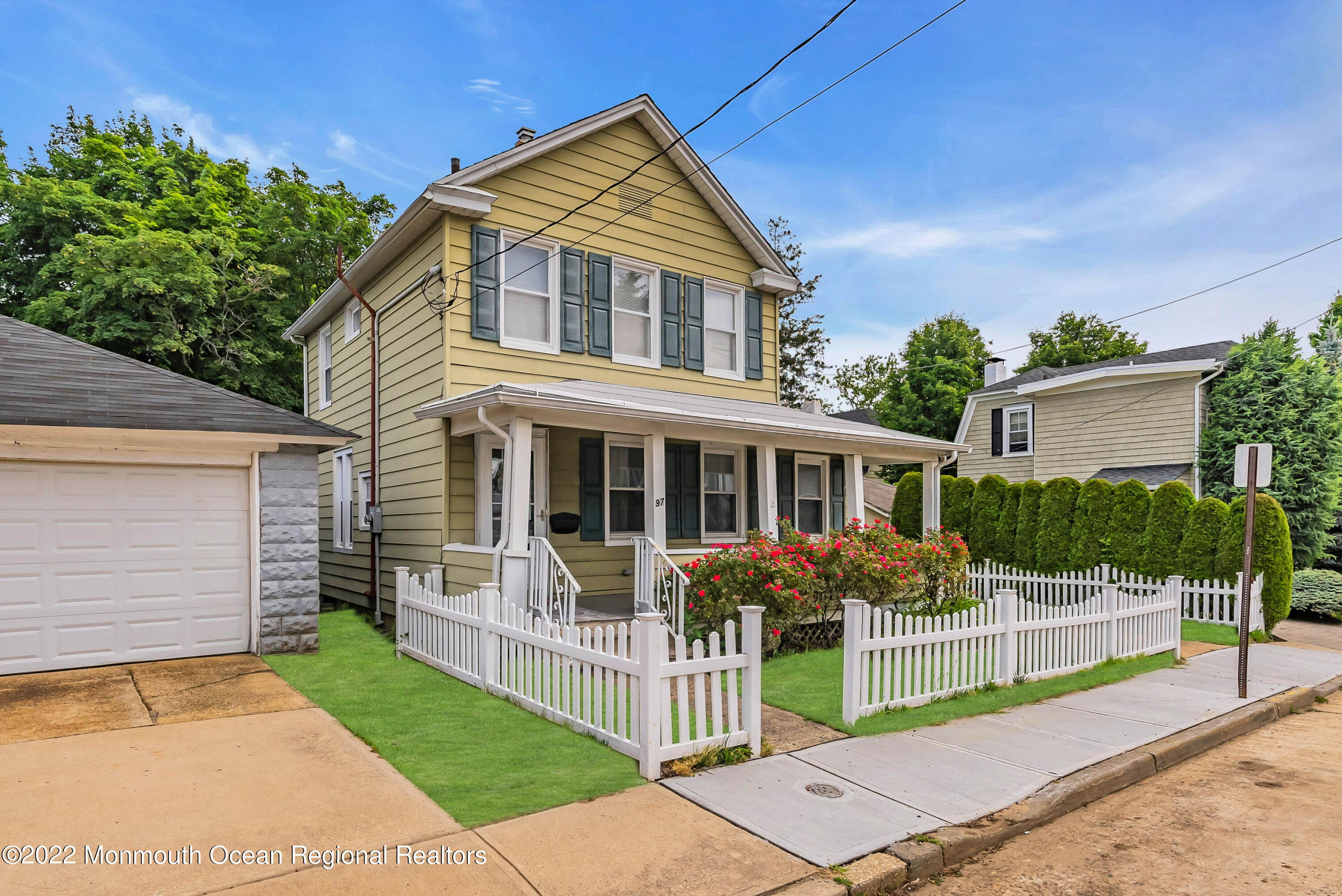97 Mechanic Street Red Bank, NJ 07701 - Photo 4 of 28 front view of house with a yard