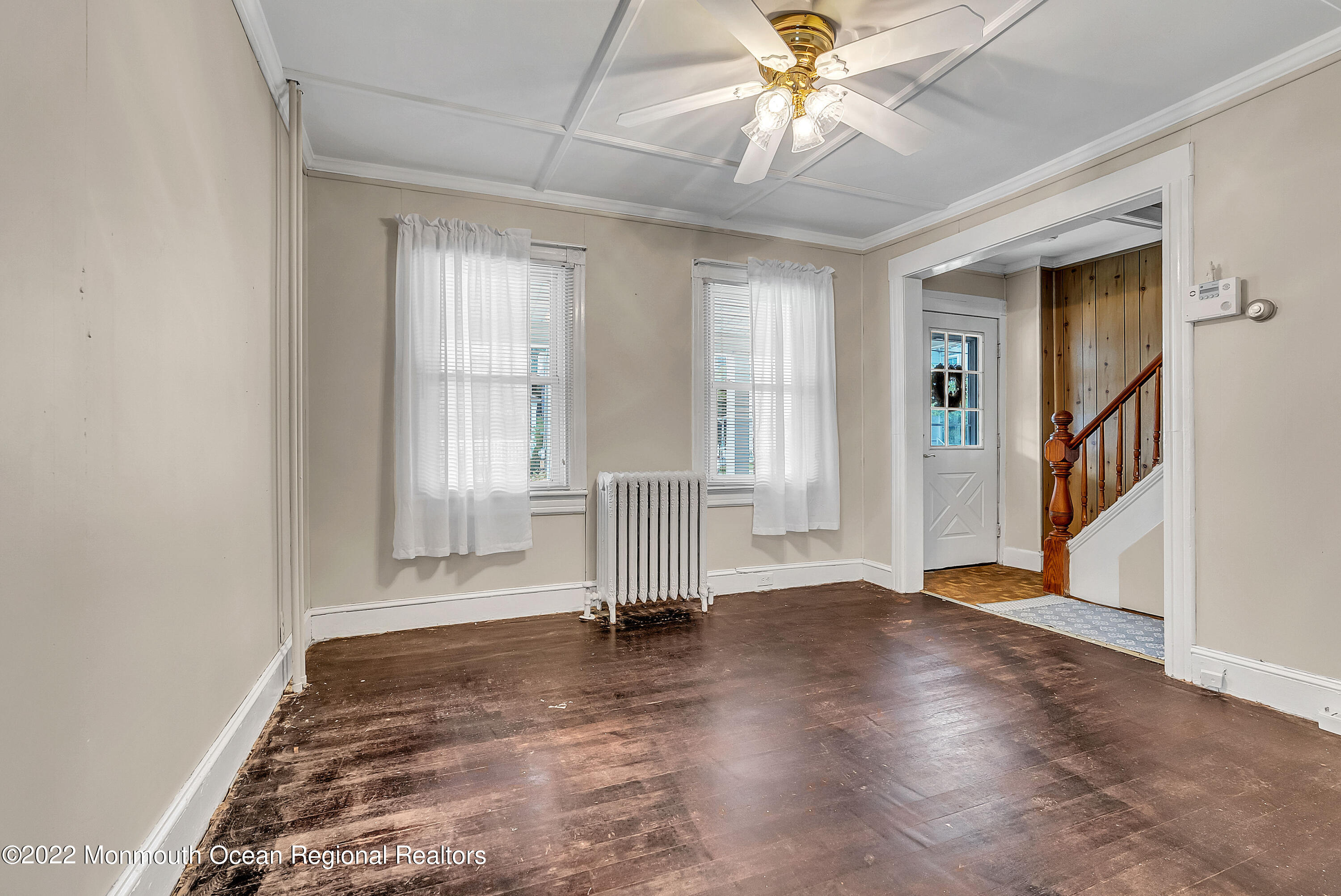 97 Mechanic Street Red Bank, NJ 07701 - Photo 8 of 28 wooden floor in an empty room with a window