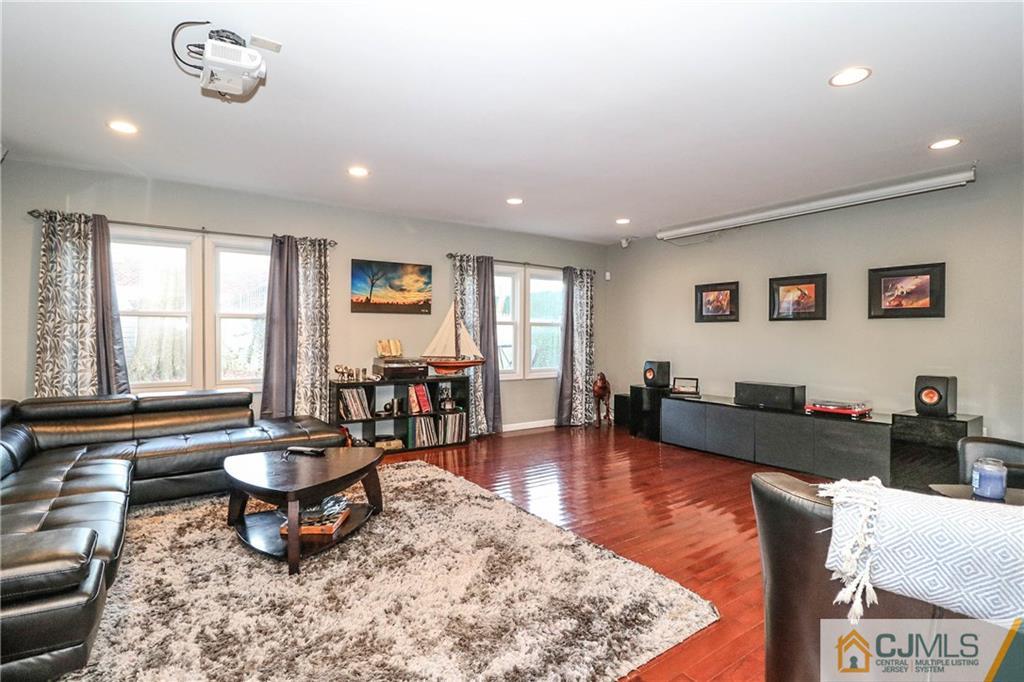4 Colton Road Edison, NJ 08817 - Photo 6 of 25 a living room with furniture a window and a table