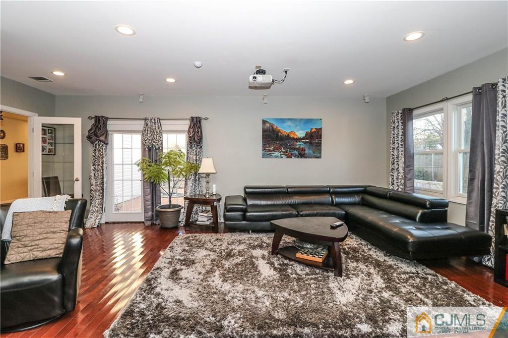 4 Colton Road Edison, NJ 08817 - Photo 7 of 25 a living room with furniture and a rug