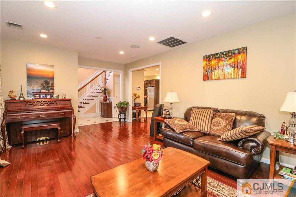 4 Colton Road Edison, NJ 08817 - Photo 8 of 25 a living room with furniture and a wooden floor