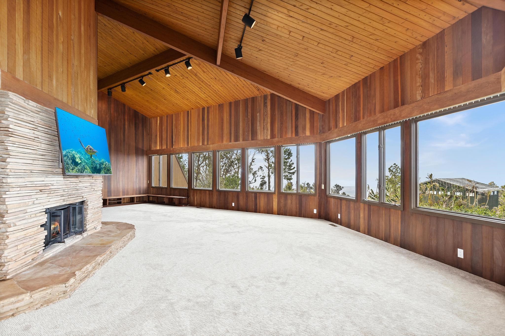 2450 Piiholo Road Makawao, HI 96768 - Photo 12 of 39 a view of a patio with a table and chairs