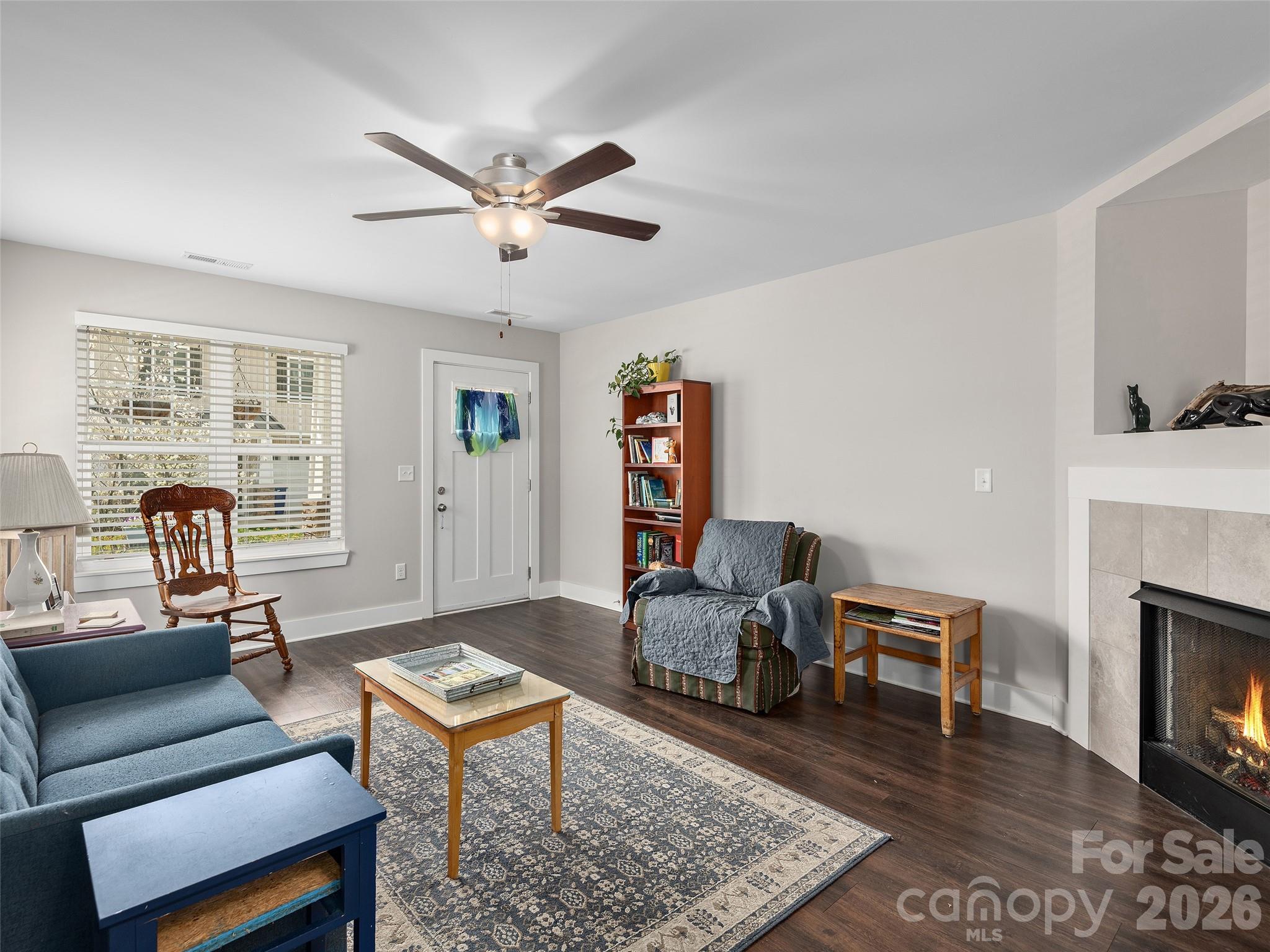 201 Stoney Point Way Candler, NC 28715 - Photo 3 of 18 a living room with furniture and a fireplace