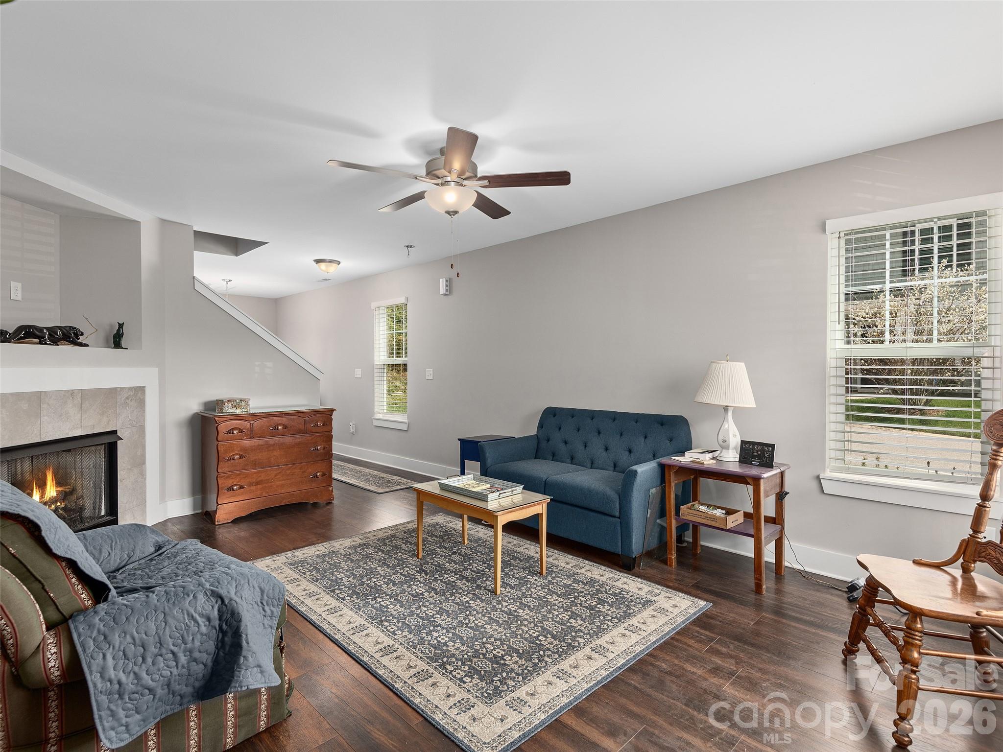 201 Stoney Point Way Candler, NC 28715 - Photo 4 of 18 a living room with furniture and a fireplace