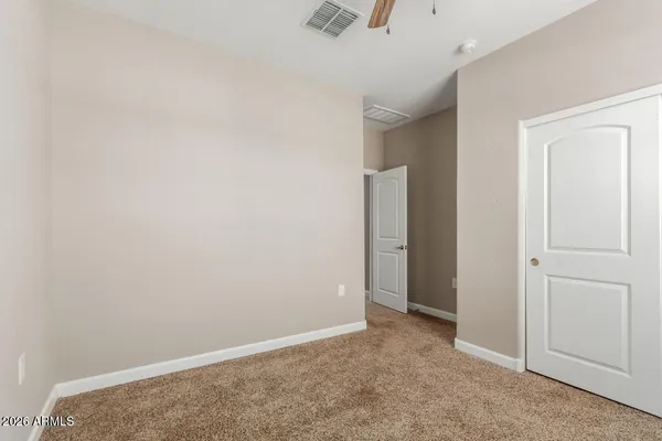 an empty room with closet