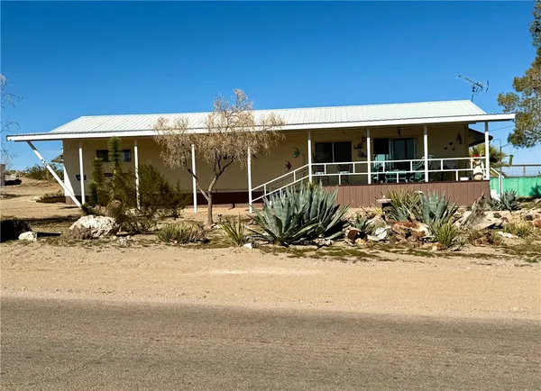 front view of a house with a patio