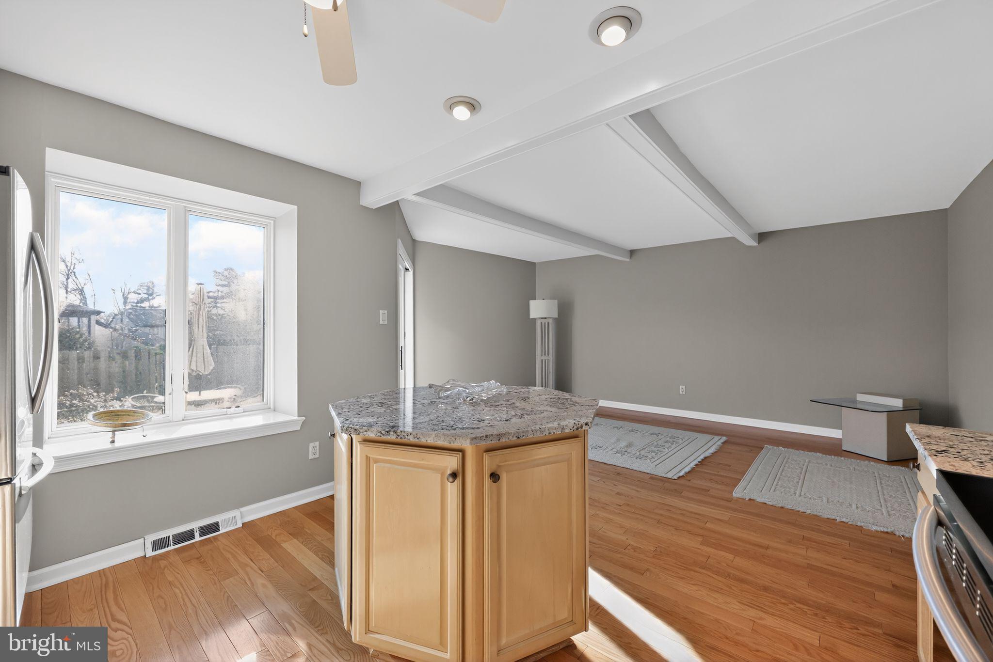 7 Garrison Place Newtown, PA 18940 - Photo 14 of 37 a view of a hallway with wooden floor and staircase