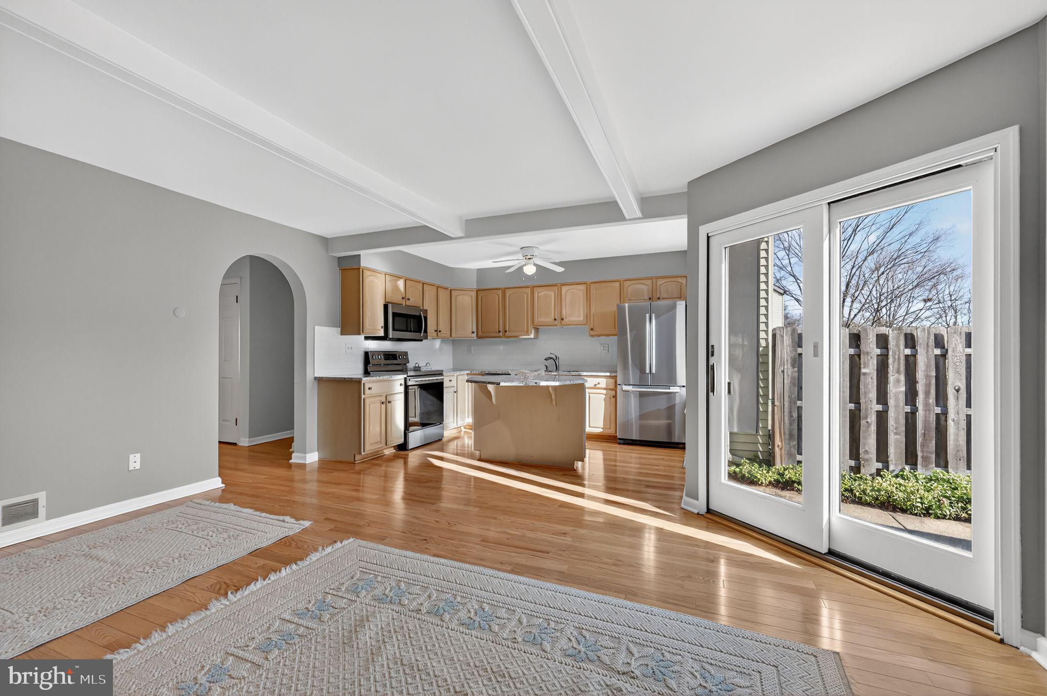 7 Garrison Place Newtown, PA 18940 - Photo 18 of 37 a room with stainless steel appliances wooden floor and a large window