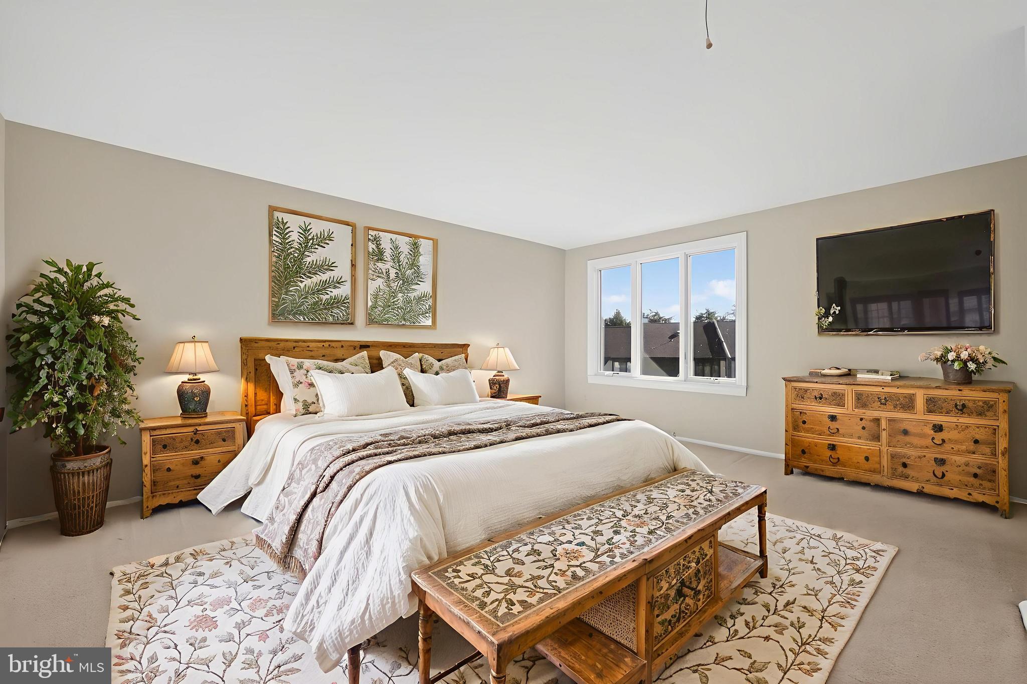 7 Garrison Place Newtown, PA 18940 - Photo 24 of 37 a bedroom with a bed and flat screen tv