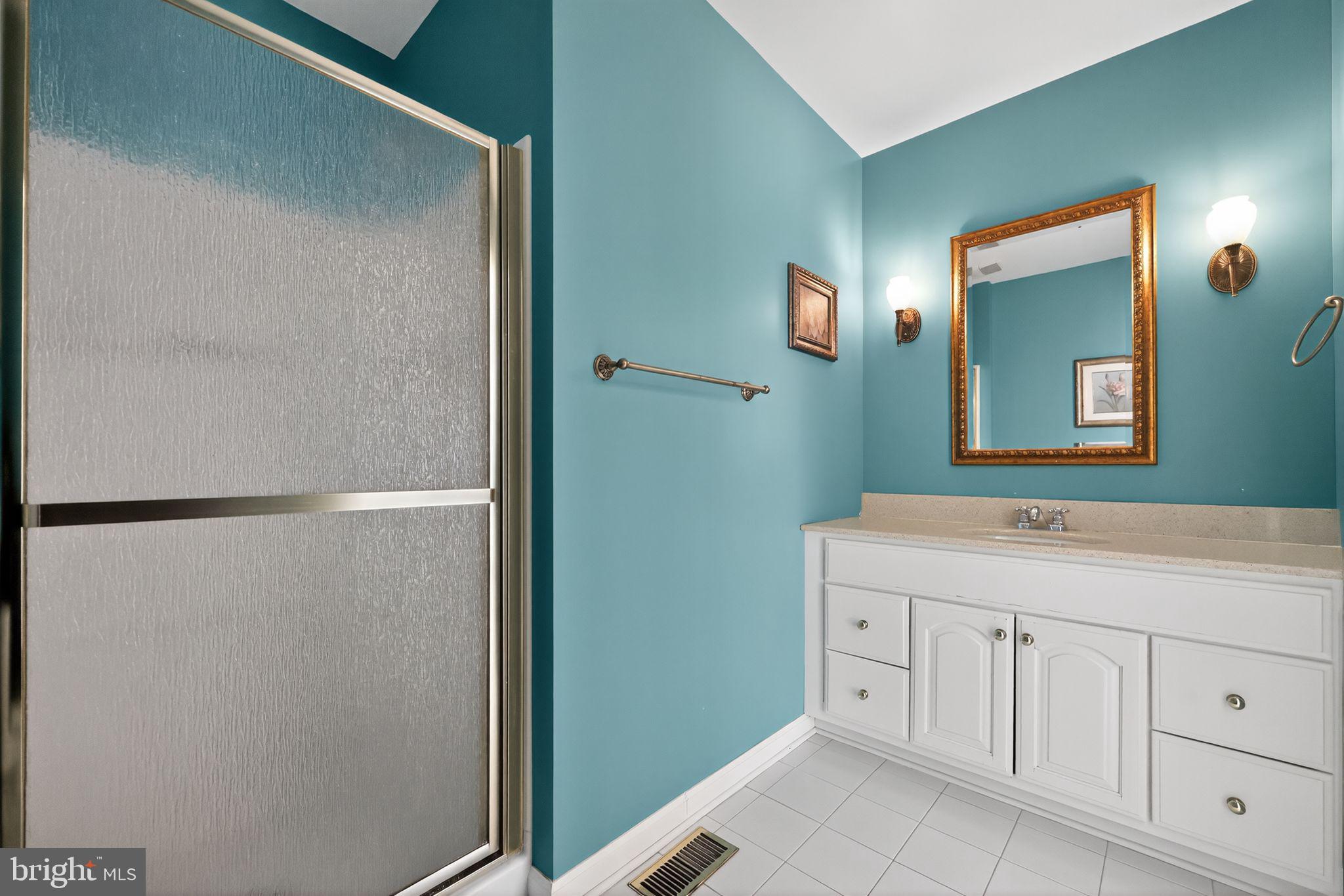 7 Garrison Place Newtown, PA 18940 - Photo 26 of 37 a bathroom with a sink and a mirror