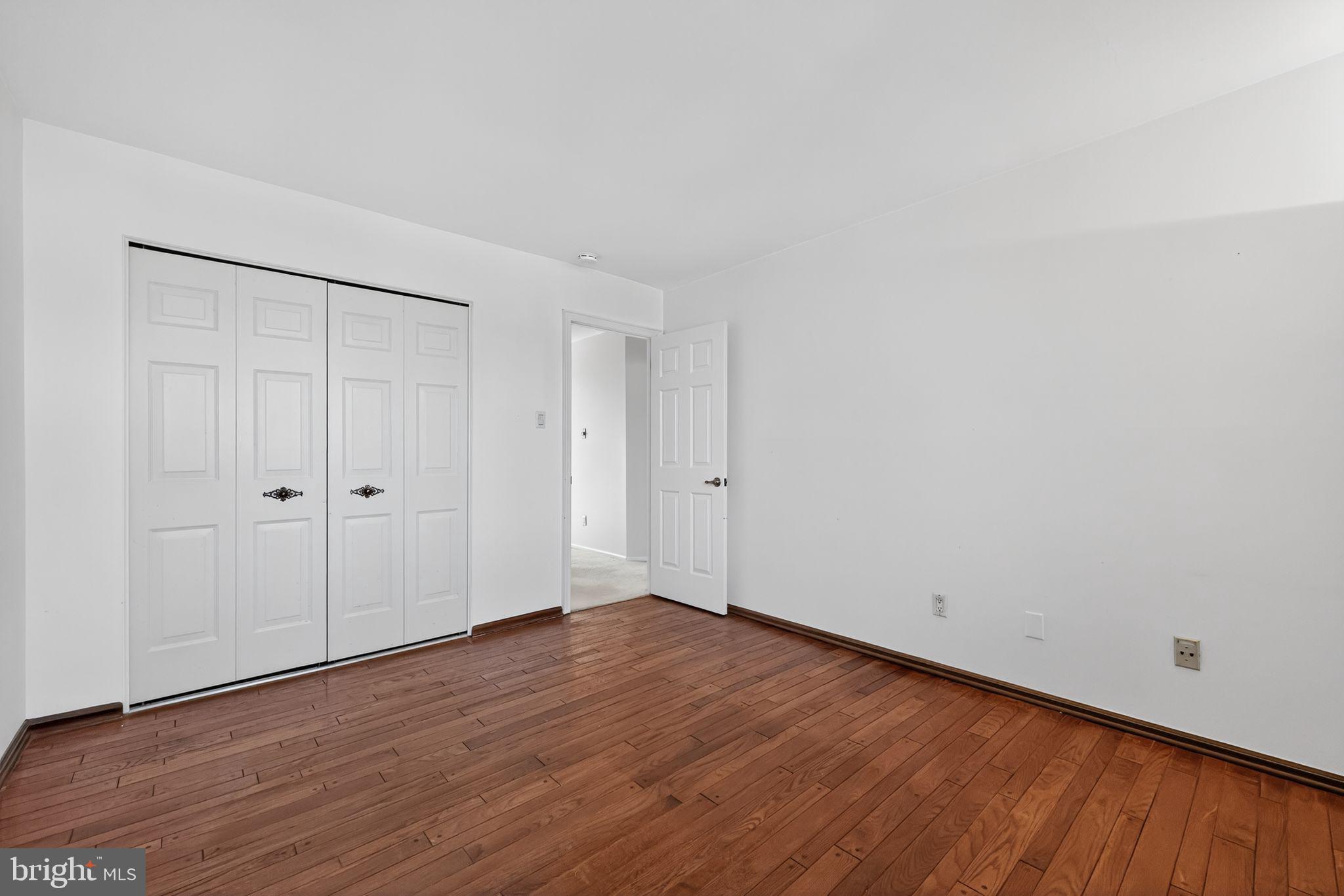 7 Garrison Place Newtown, PA 18940 - Photo 30 of 37 a view of an empty room with wooden floor