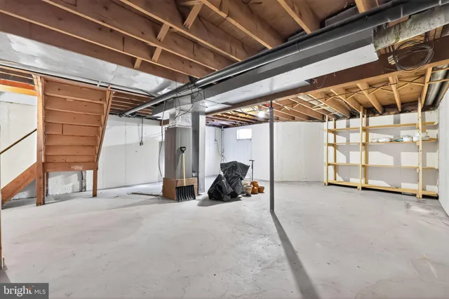 a view of a room with wooden walls