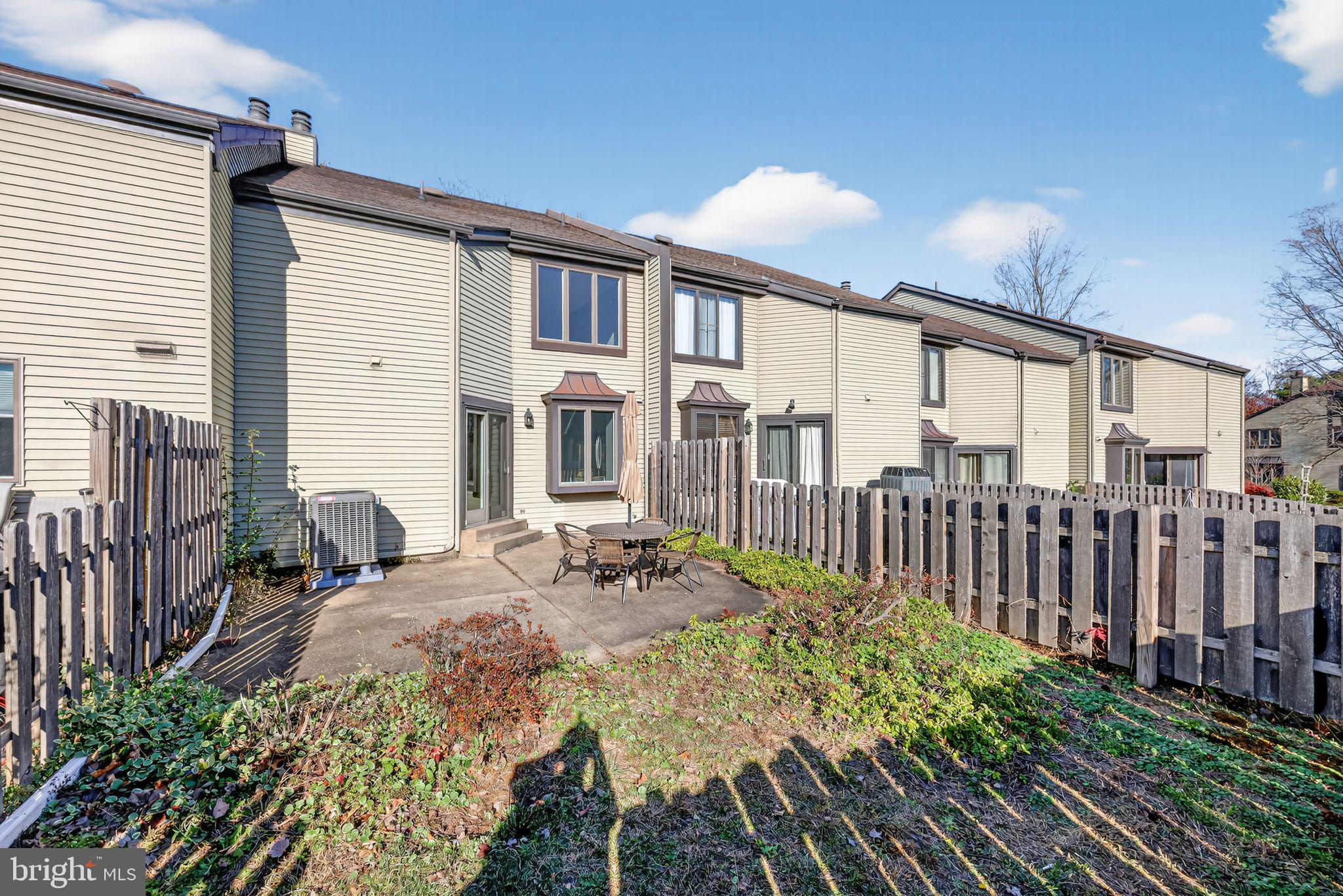 7 Garrison Place Newtown, PA 18940 - Photo 37 of 37 a view of a porch with furniture and backyard