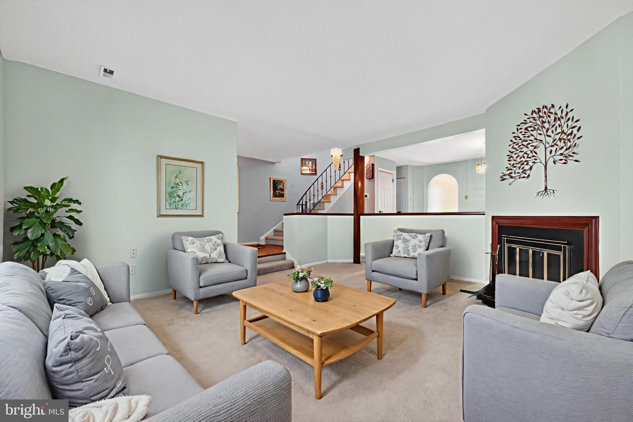 7 Garrison Place Newtown, PA 18940 - Photo 5 of 37 a living room with furniture and a potted plant