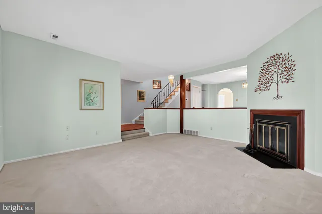 a view of a livingroom with a staircase