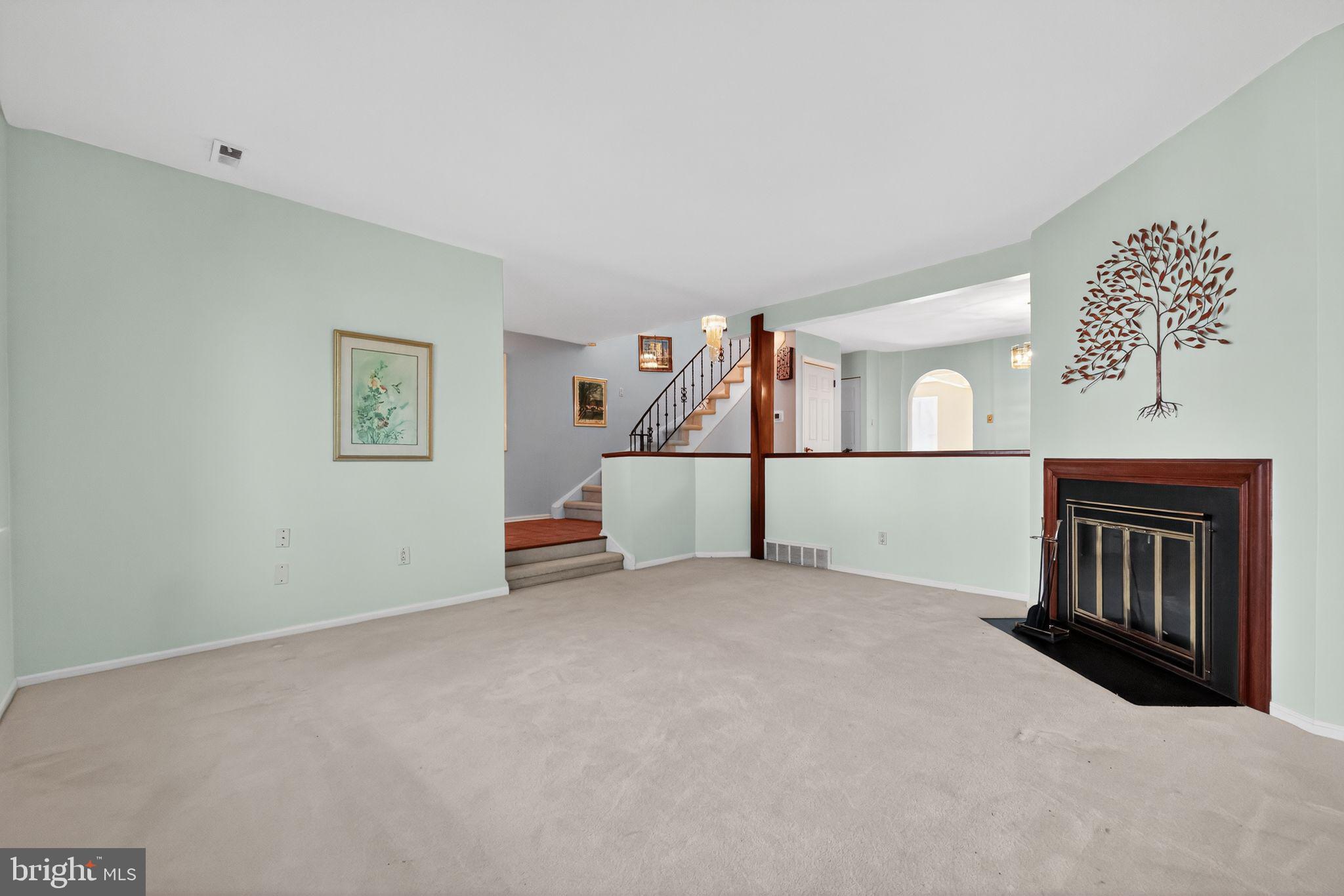 7 Garrison Place Newtown, PA 18940 - Photo 6 of 37 a view of a livingroom with a staircase