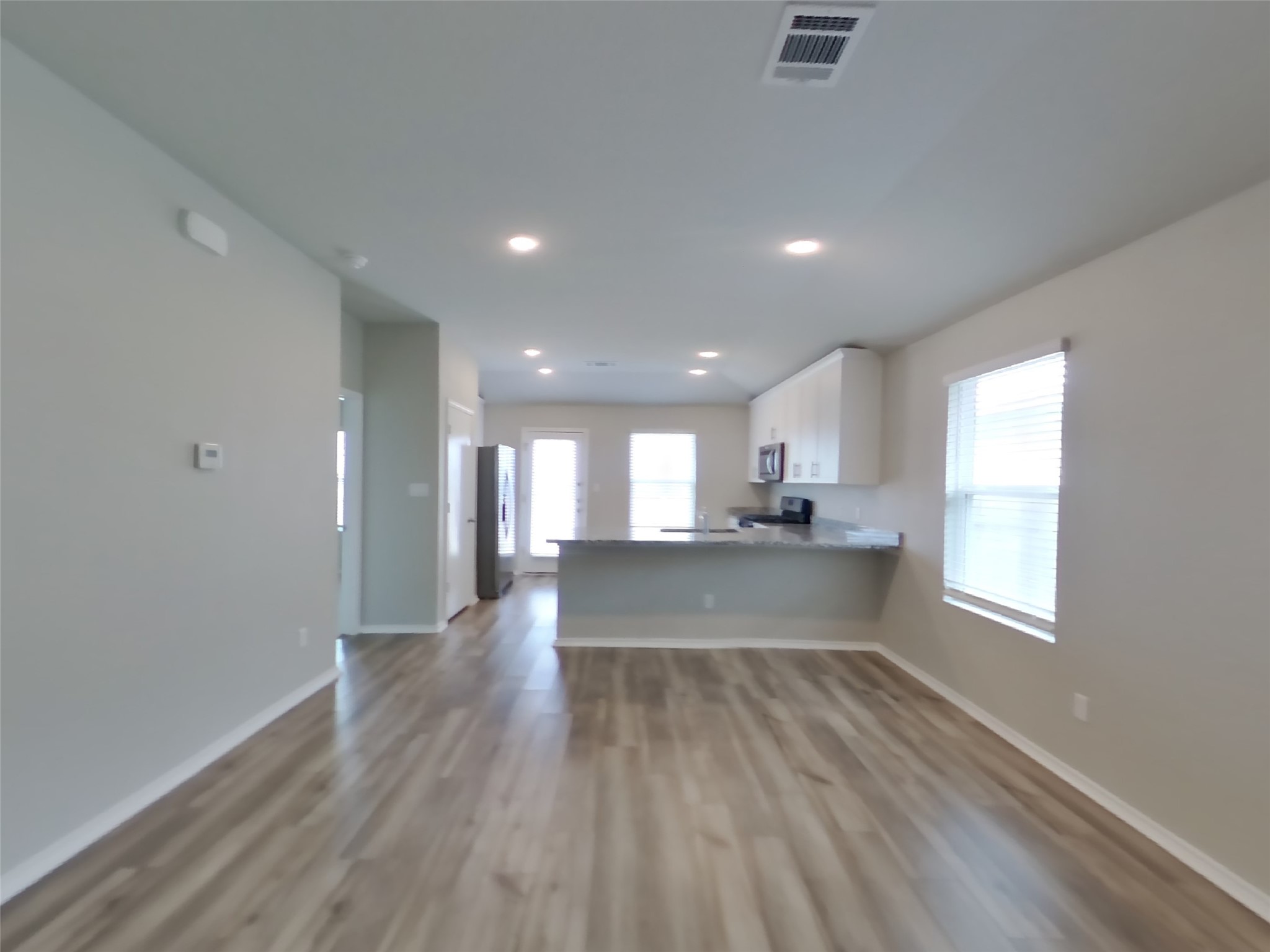 3509 Gooseneck Lane Georgetown, TX 78626 - Photo 26 of 26 a view of large kitchen with a sink and wooden floor